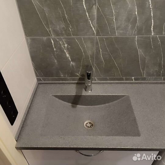 Каменная раковина для ванной