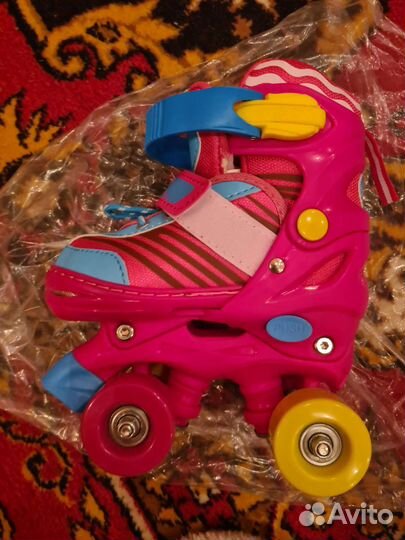 Роликовые коньки