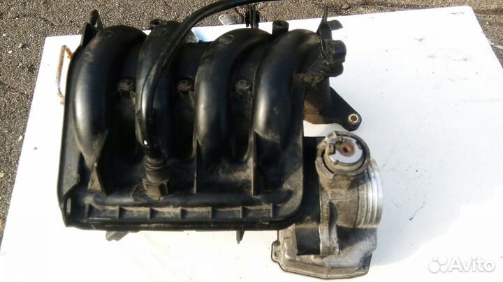 Пежо 206 1.4л Коллектор впускной