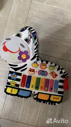 Игрушка Зебра музыкальная