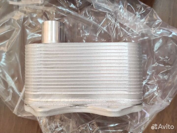 06J117021J Радиатор масляный VAG