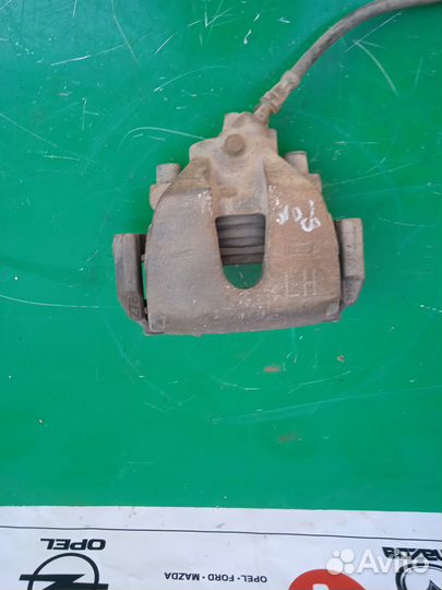 Суппорт тормозной передний Ford Focus 2