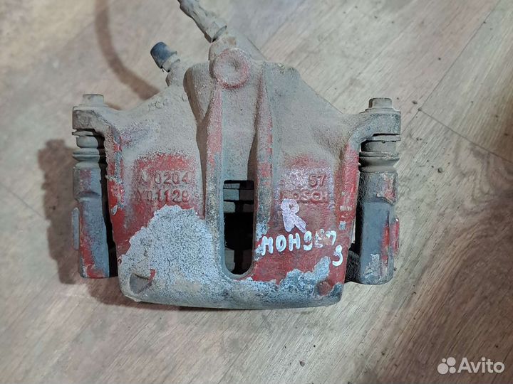 Суппорт передний правый /левый Ford Mondeo 3