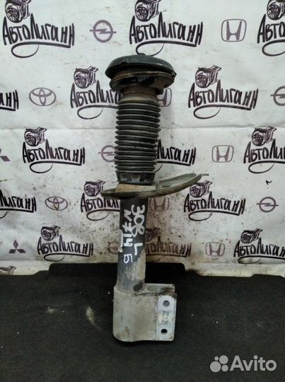 Амортизатор передний левый Peugeot 308