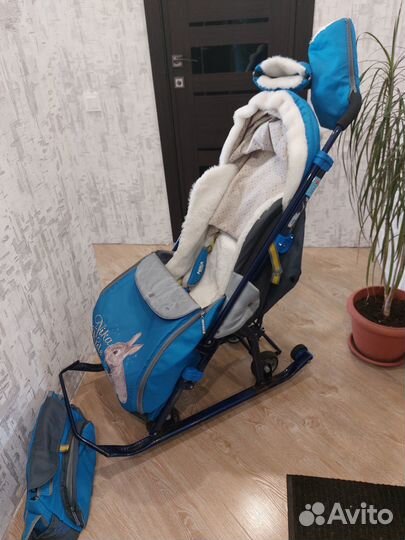 Зимняя коляска-сани