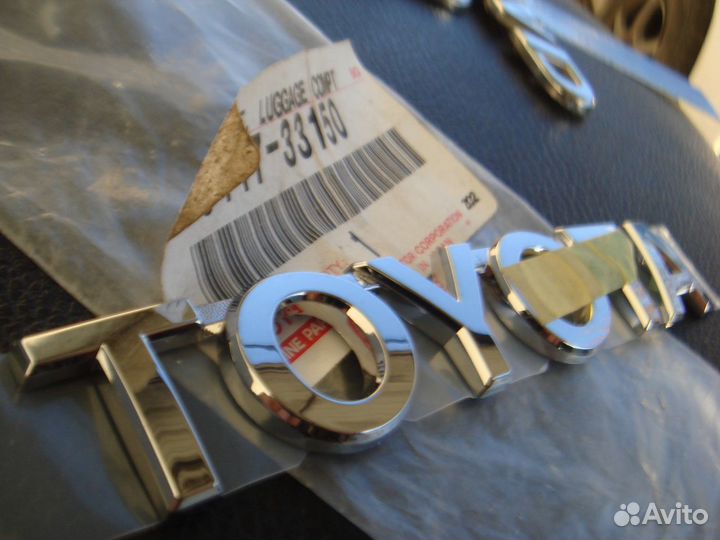 Тойота Камри Эмблема задняя Camry 50 2011-18