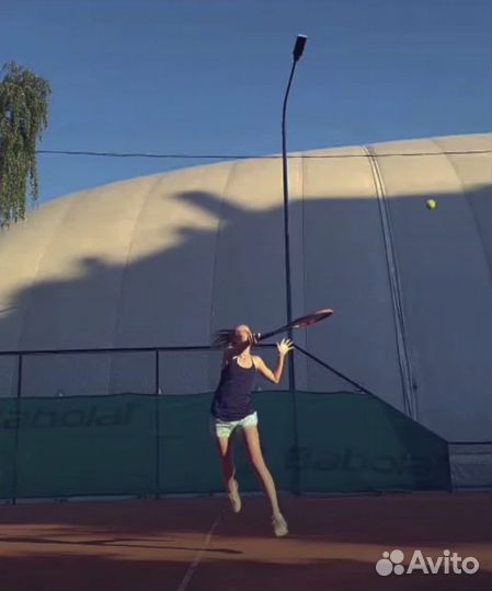 Тренер по большому теннису