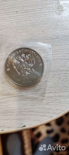 Монеты Олимпийских игр в Сочи 2014 и FIFA 2018