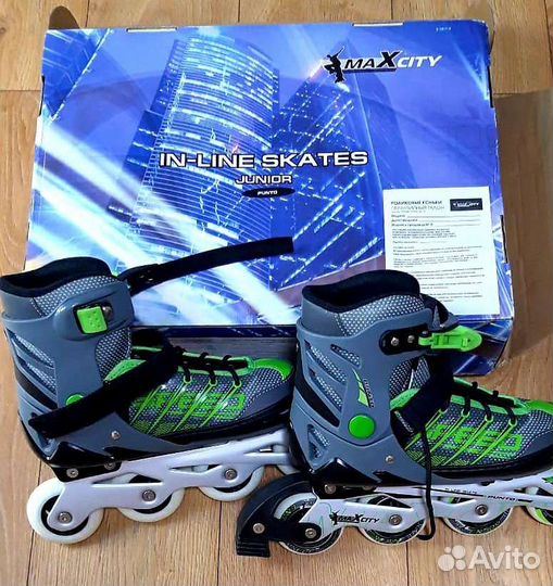 Роликовые коньки