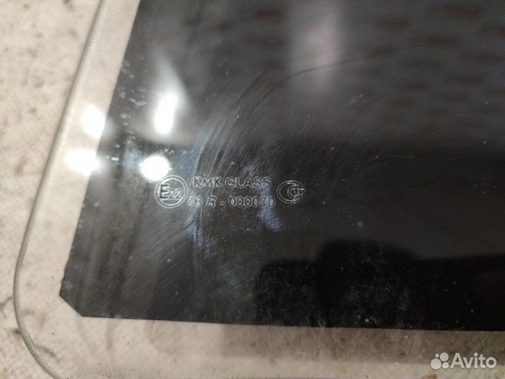 Стекло двери заднее левое Renault Logan LS0G