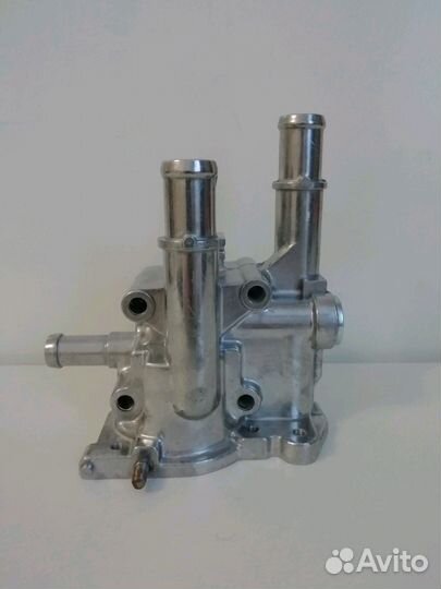 Корпус термостата на Опель и Шевроле