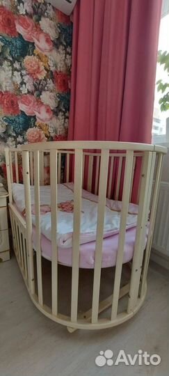 Детская кроватка с маятником круглая овальная