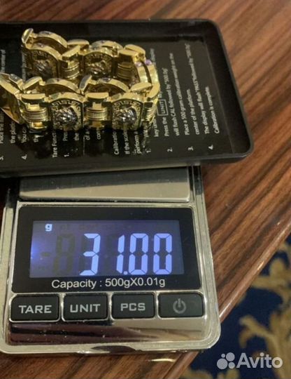 Золотой браслет versace