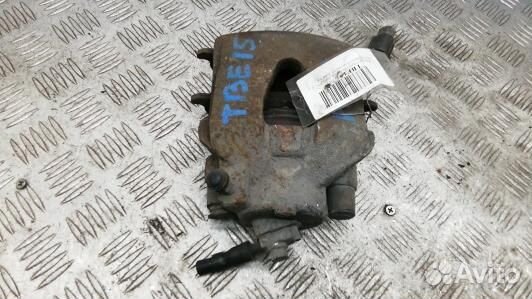 Суппорт тормозной передний левый volkswagen jetta