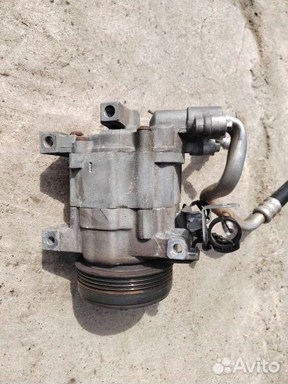 Компрессор кондиционера на Субару Импреза