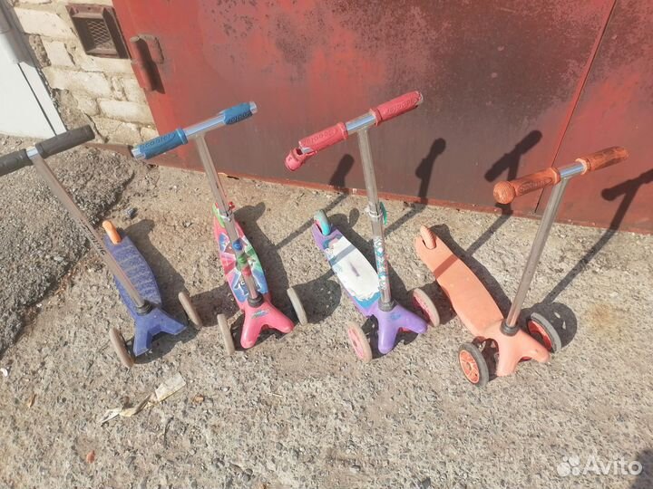 Детский самокат и трехколесный велосипед