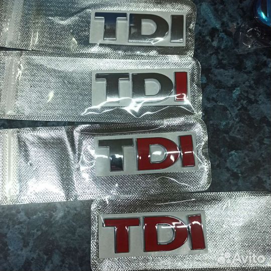 Эмблема TDI
