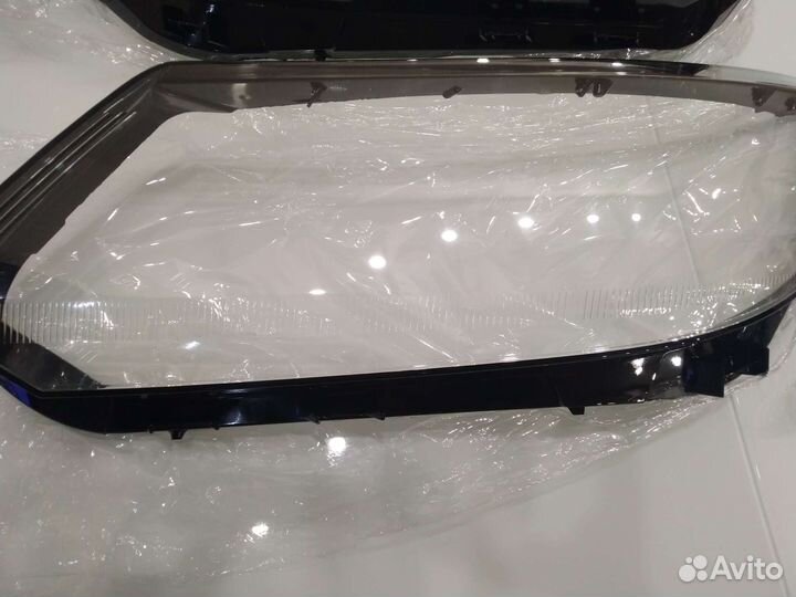 Стекло фары Фольксваген Тигуан 1