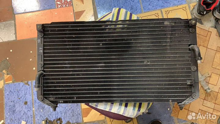 Радиатор кондиционера Тойота корона калдина Карина