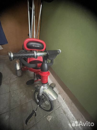 Трехколесный велосипед с ручкой