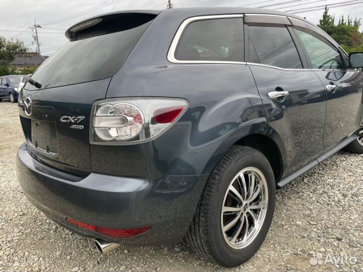 В разборе Mazda CX-7 (ER) 2011г. рестайлинг