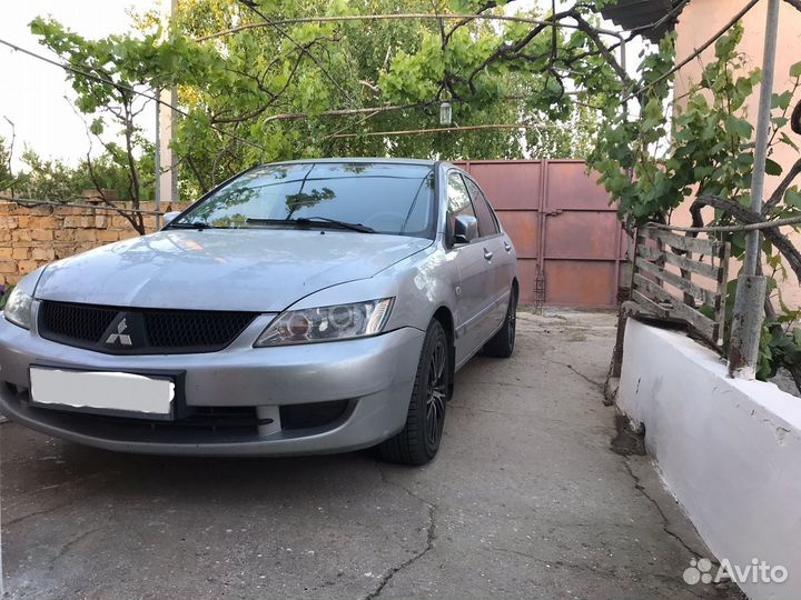 Mitsubishi Lancer 1.6 AT, 2005, 228 000 км