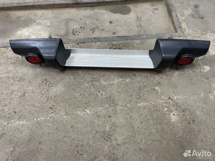 Бампер задний Mitsubishi L200