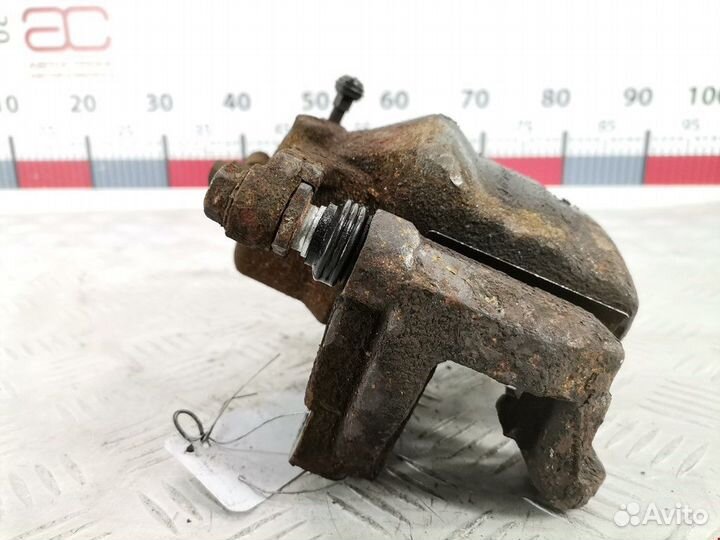 Суппорт передний левый Nissan Qashqai+2 2010