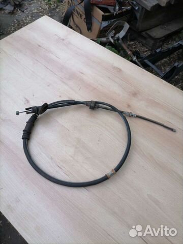 Тросик ручника Mitsubishi Lancer 9