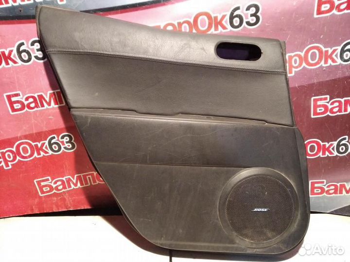 Обшивка двери Mazda CX-7 задн. лев. (б/у)