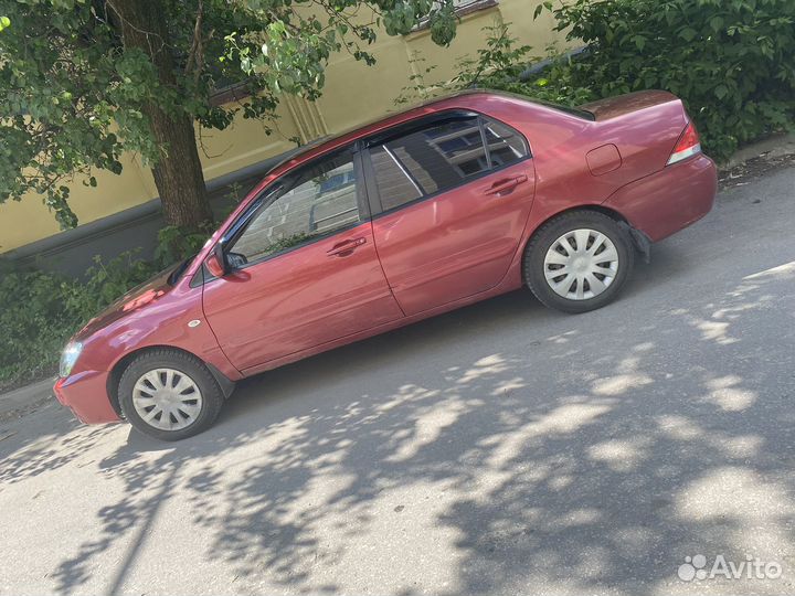 Mitsubishi Lancer 1.6 МТ, 2009, 210 000 км