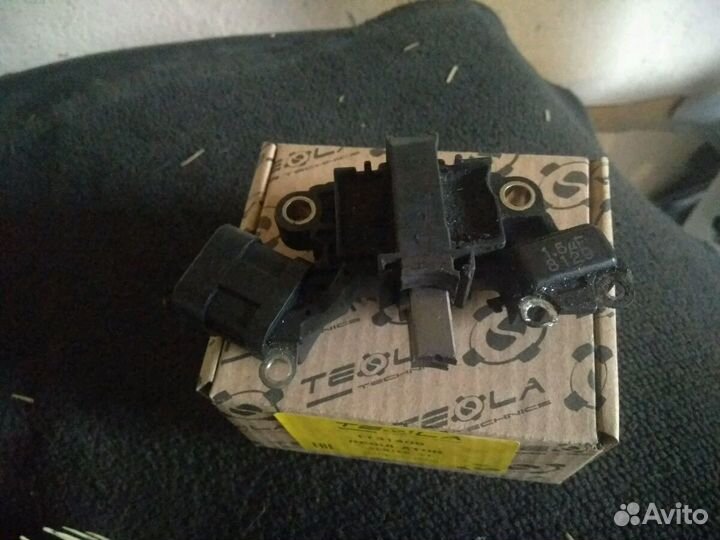 Регулятор напряжения Ниссан-Санни'97