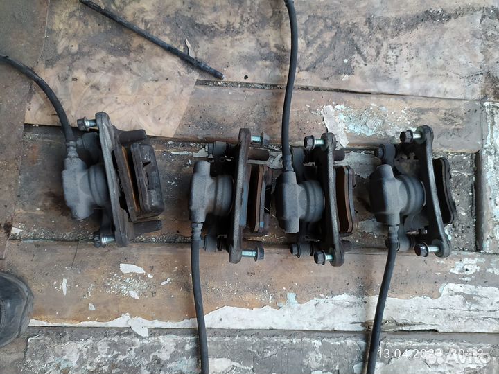 Тормозной суппорт задний на outlander xl