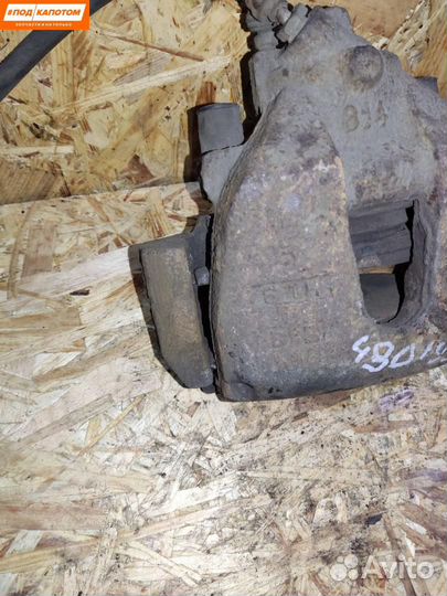 Суппорт тормозной передний правый Mazda 3 BL