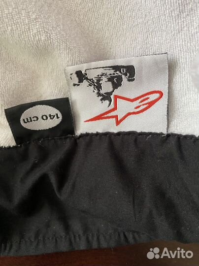 Комбинезон для занятий картингом и шлем