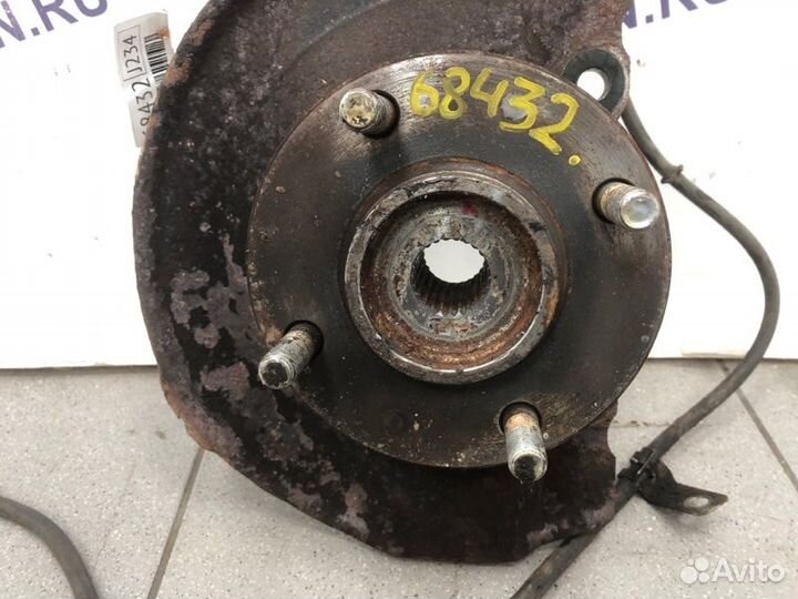 Кулак поворотный передний правый Mitsubishi Lancer