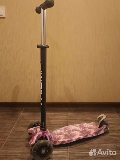 Самокат трёхколёсный