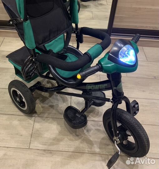 Трехколесный велосипед-коляска с ручкой