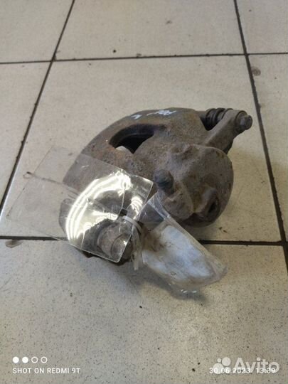 Суппорт тормозной передний левый Volkswagen Polo