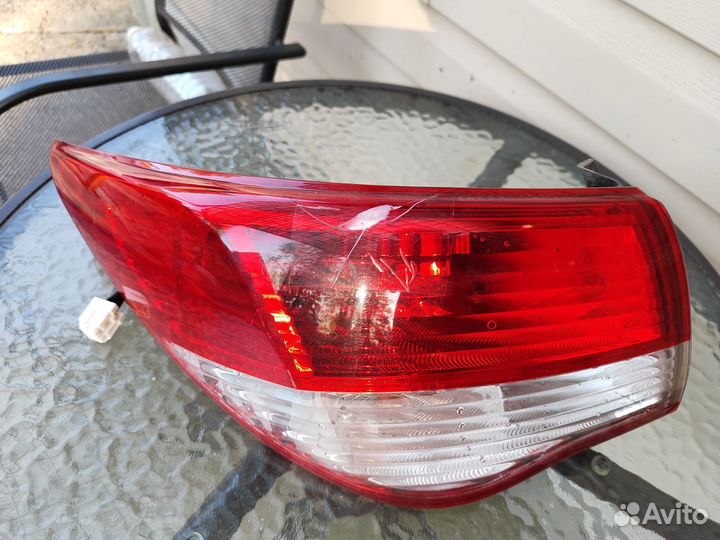 Фонарь задний левый Nissan Almera G15