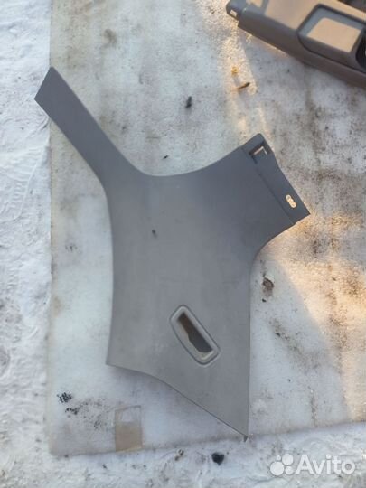 Обшивка багажника правая Opel Zafira B