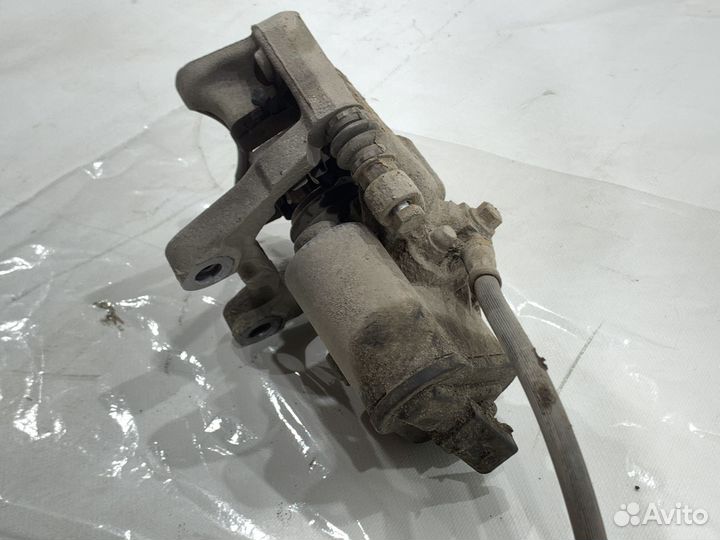 Суппорт тормозной задний левый VAG