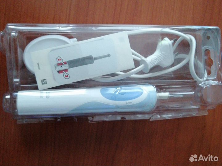 Электронная зубная щетка