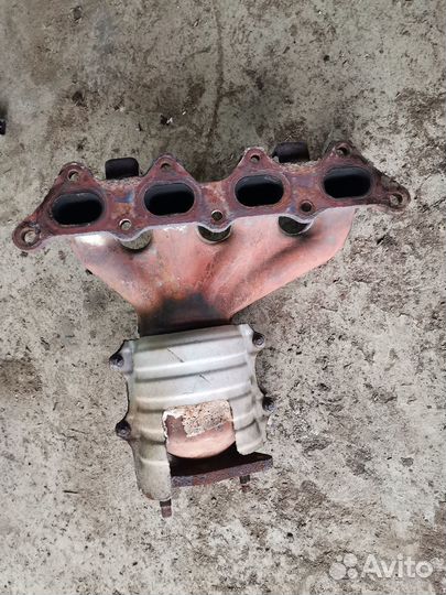 Коллектор выпускной 4G18 Mitsubishi Lancer 9