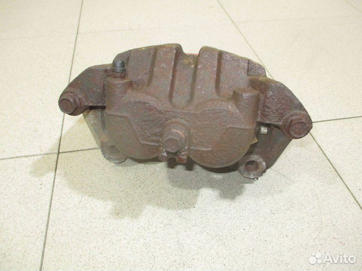 Суппорт передний правый Nissan Navara (D40)