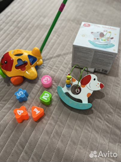Игрушки каталки пакетом для малыша