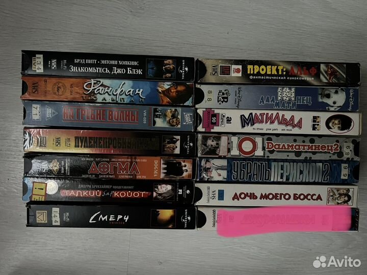 Видеокассеты с фильмами и мультиками