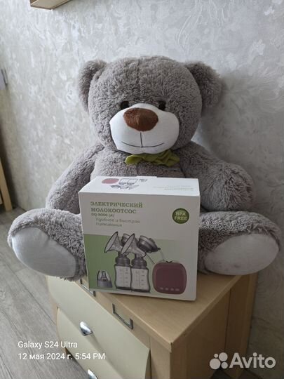 Электрический молокоотсос