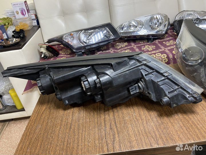 Фара левая Kia Sportage 3 SL 10-16г