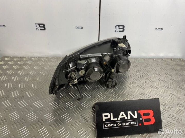 Фара ксеноновая передняя левая Nissan Almera N16